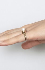 Gold round signet ring set with a fresh water pearl