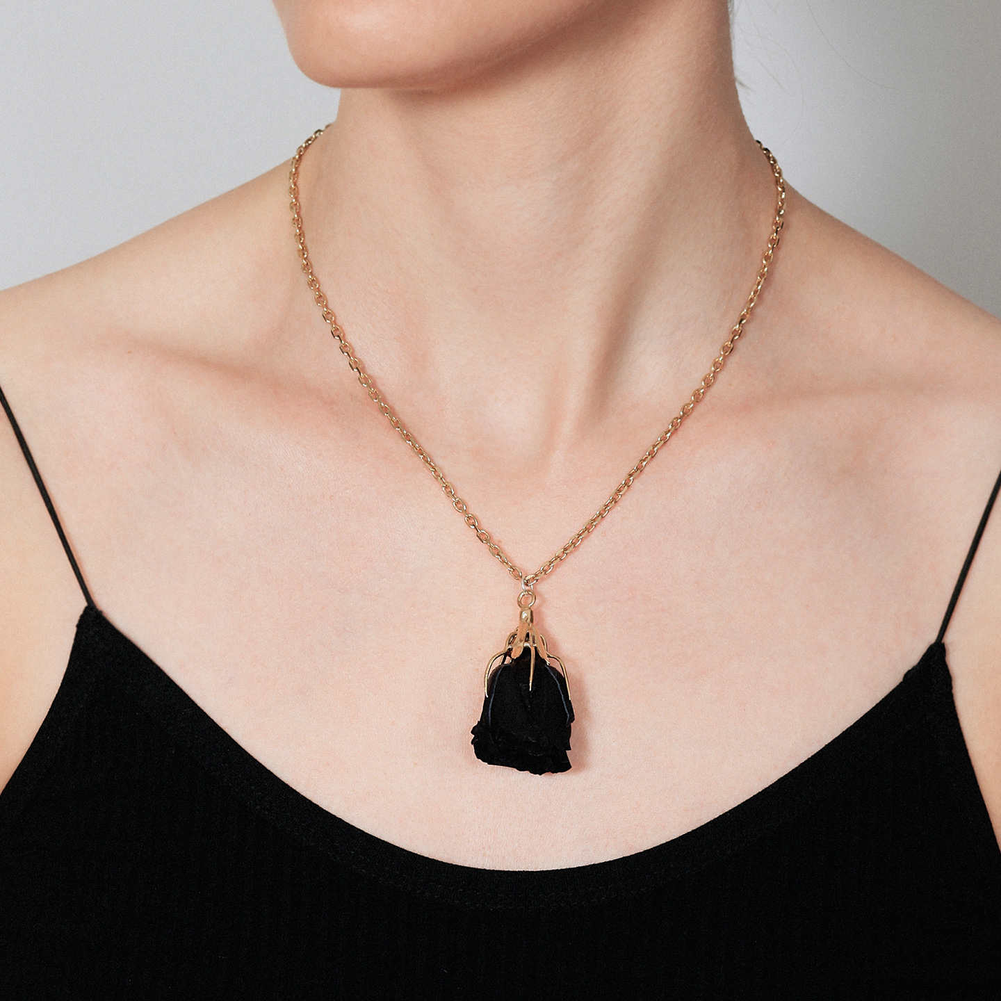 Gold necklace with natural black rose