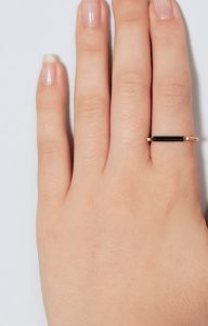 Gold ring with minimalist black bar