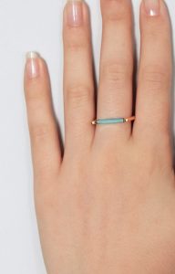 Gold ring with minimalist neon blue bar