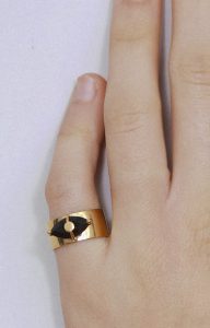 Gold ring with a black spinel